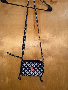 Vera Bradley Navy Crossbody with White Floral Trim and Red Accent
